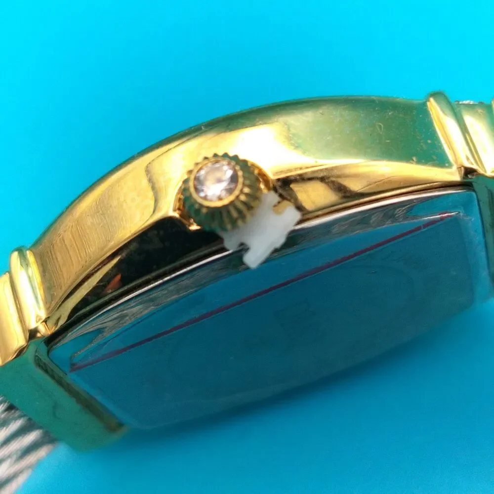 DMQ Women's Gold Tone Cubic Zirconia Mother of Pearl Dial Cable Bangle Watch